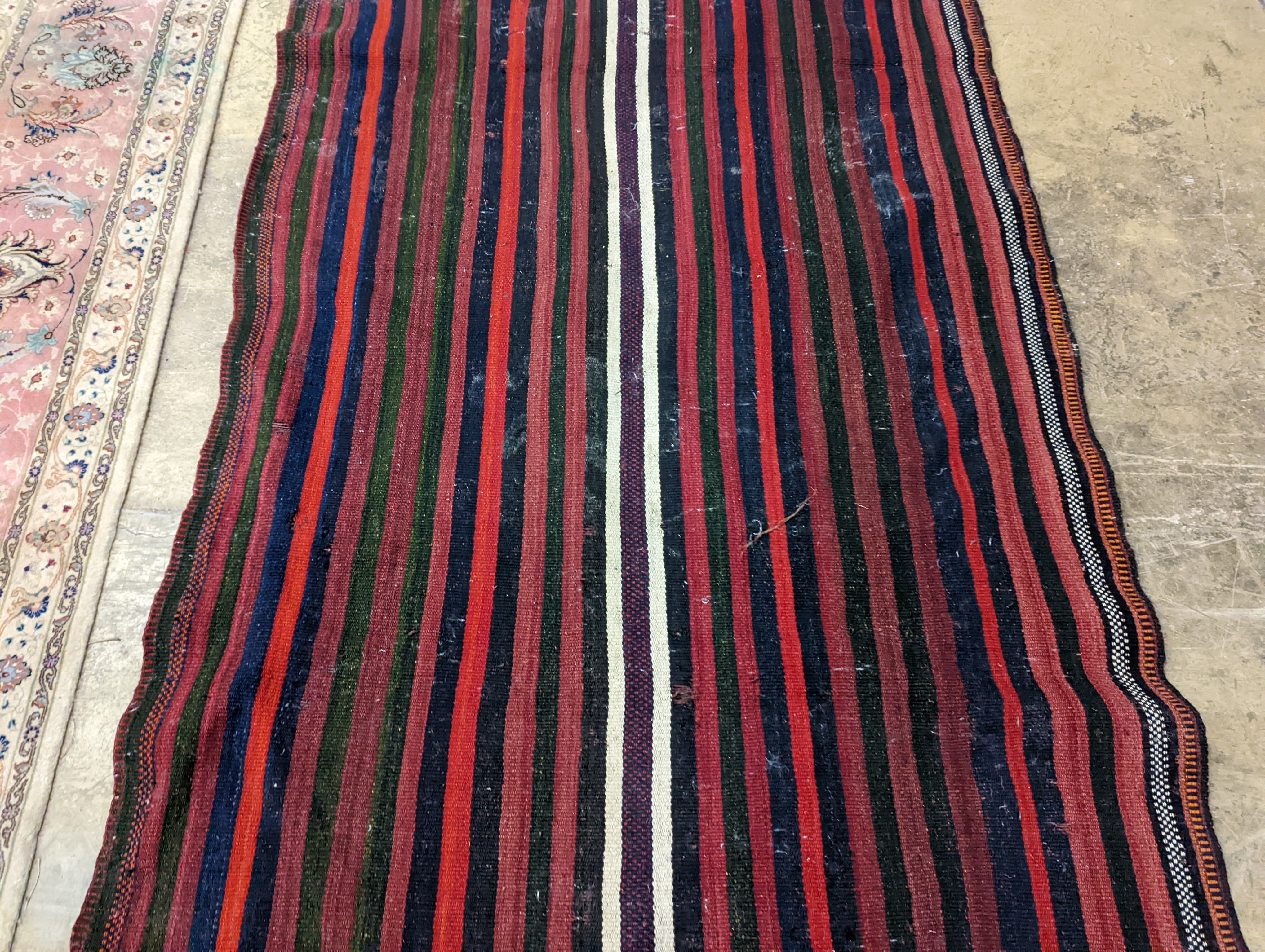 A polychrome flatweave hall carpet, 380 x 124cm